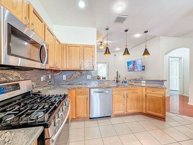 Building Photo - Now for Rent – Spacious 4-Bedroom Home in ...