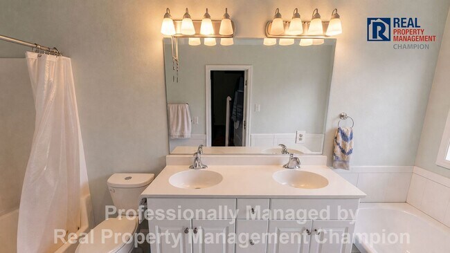 Building Photo - 3BD/2BA home w/vaulted ceilings, fireplace, 2-car garage, deck and fenced backyard