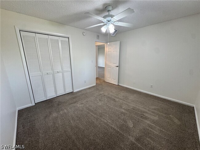 Building Photo - 12250 Tamiami Trl E