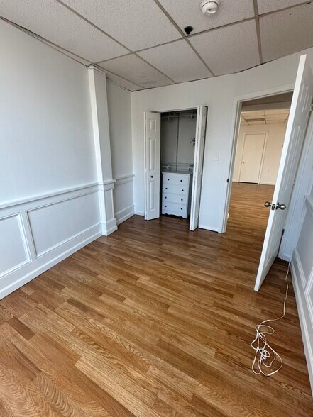 Bed room 3 with large closet and new double paned windows. - 5 E Broad St