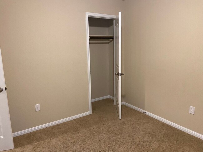 Building Photo - Three Bedroom, Two Bath, Two Car Garage, Washer and Dryer are included.