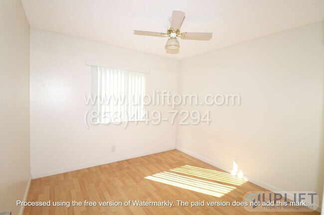 Building Photo - 4 bed, 2 Bath Home With Fenced Yard and attached 2 Car Garage