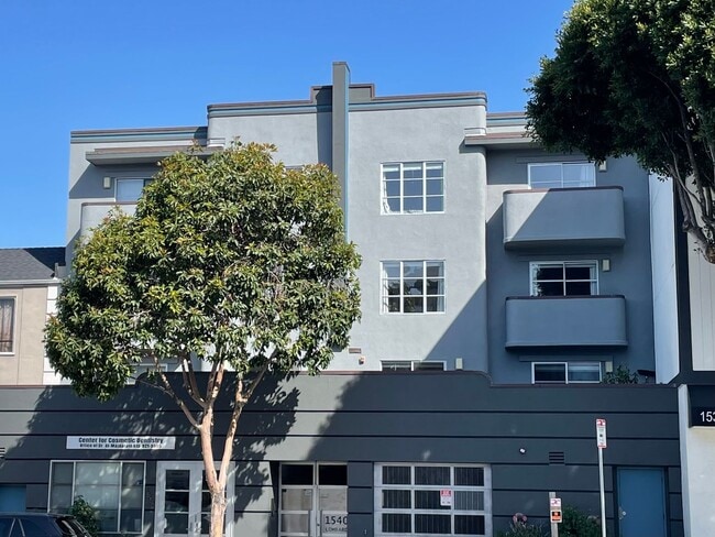 Building Photo - Beautiful 2BR/1BA with Large Private Patio, Parking & Shared Rooftop Deck in Marina