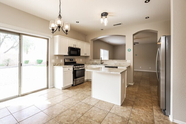 Building Photo - 12925 W Charter Oak Rd