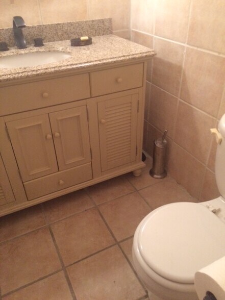 First floor toilet - 695 A1A North