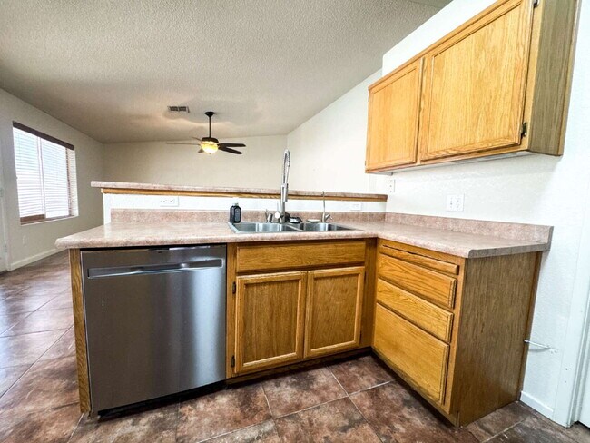 Building Photo - "Charming 3-Bed, 2-Bath Solar and Pool Home!"