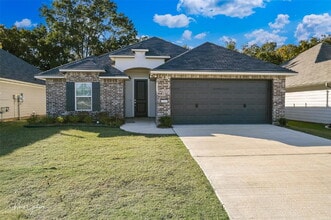 Building Photo - "Charming 3-Bedroom Oasis with Granite Ele...