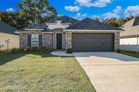 Building Photo - "Charming 3-Bedroom Oasis with Granite Ele...