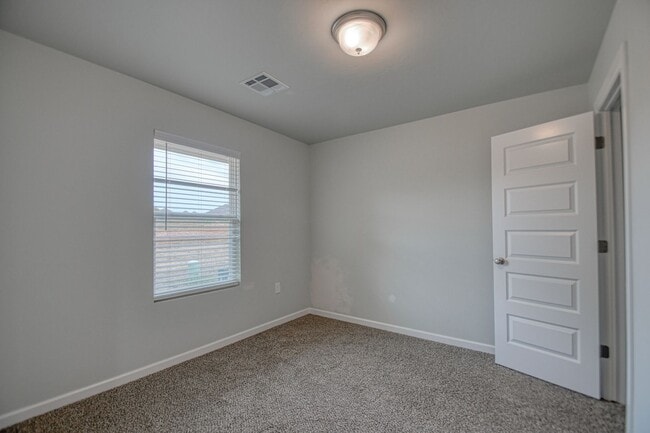 Building Photo - New Construction in Varenna Landing! Storm shelter and lawn care included!