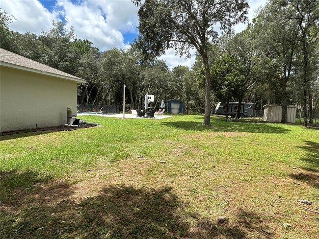 Building Photo - 5774 N Lamp Post Dr