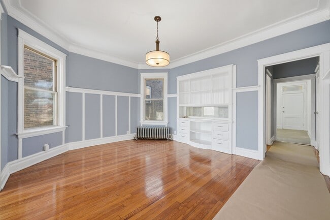 Building Photo - 7442 S Langley Ave