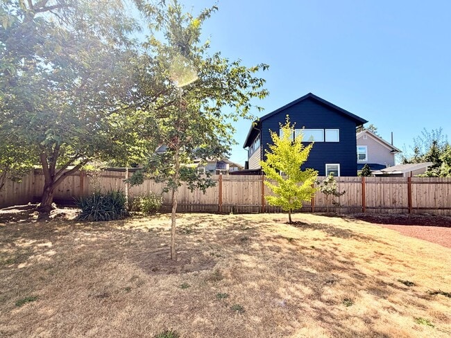 Building Photo - 2 Weeks Free! Charming Craftsman with Solar Savings, Hardwood Floors, and Private Backyard - Move...