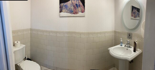 bathroom near kitchen - 302 E Uintah St