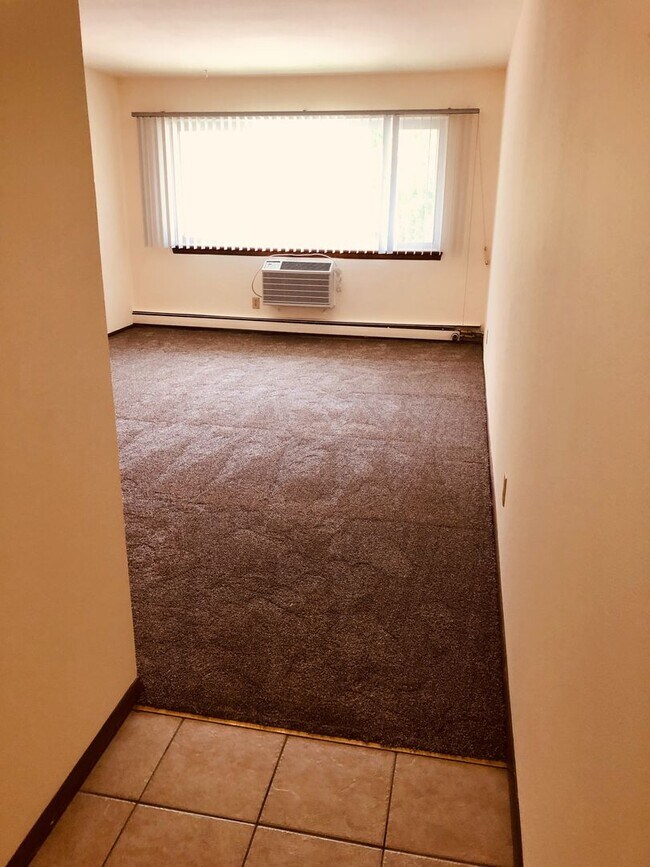 Building Photo - Spruce Court Apartment - Greenfield WI - Call 262-420-0390 to schedule a showing