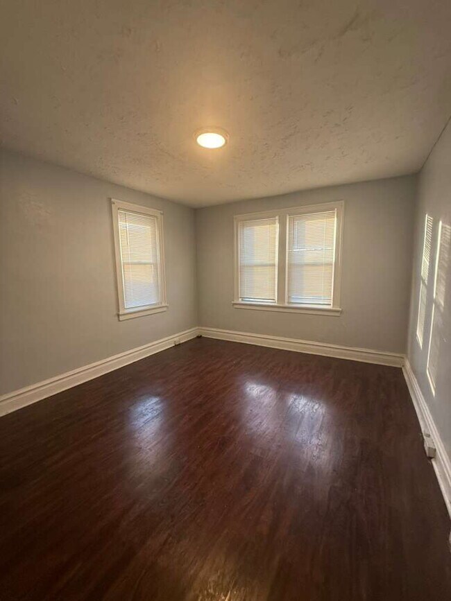Building Photo - "Charming 2-Bedroom St. Louis Home with Gleaming Hardwood Floors in 63121!"