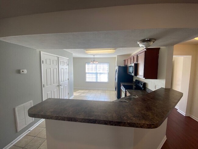 Building Photo - End Unit Townhouse Now Available at Barnes...