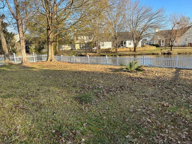 Building Photo - 3 x 2 with garage and pond view