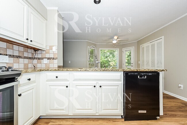 Building Photo - Turn the key. Enter. Smile. Repeat every day!