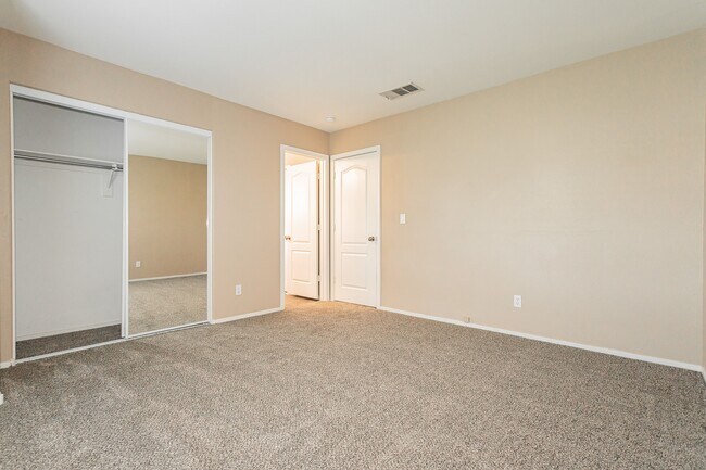 Guest room 1. Large closer, access to bathroom. - 8600 Mirada del Sol Dr