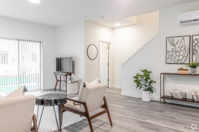3BR, 2.5BA - 1464SF Living Room - Terra Lofts Apartments & Townhomes