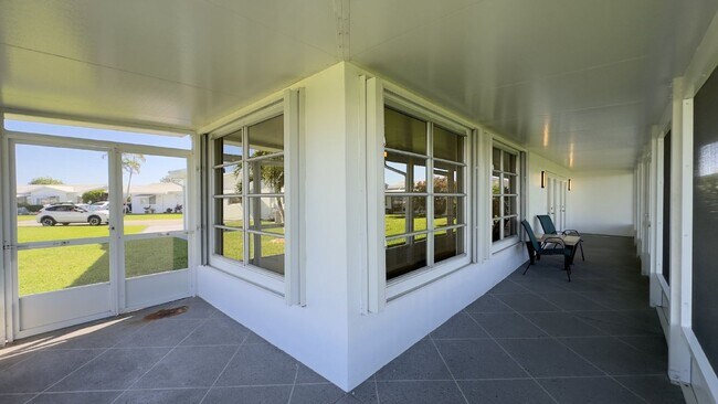 Building Photo - Lakefront 2BR Home in 55+ Leisureville Community