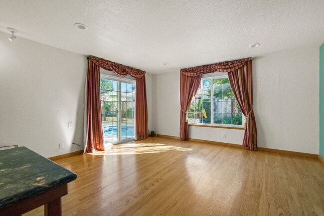 Building Photo - POOL PARADISE IN A COVETED NEIGHBORHOOD STYLISH UPGRADES | EXTREME CONVENIENCE