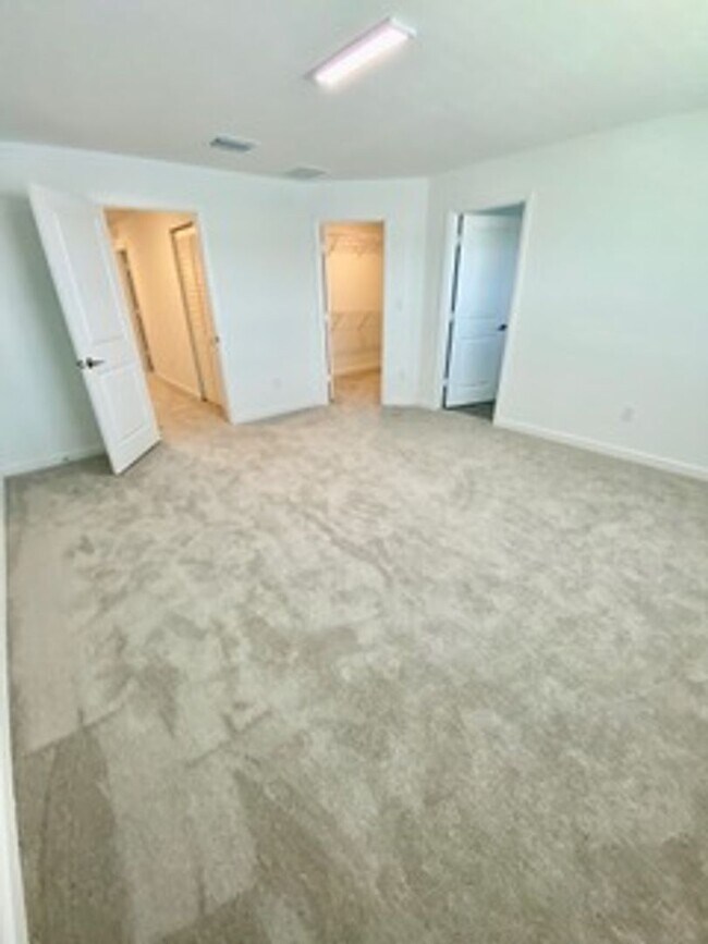 Building Photo - Brand new Townhome centrally located in La...