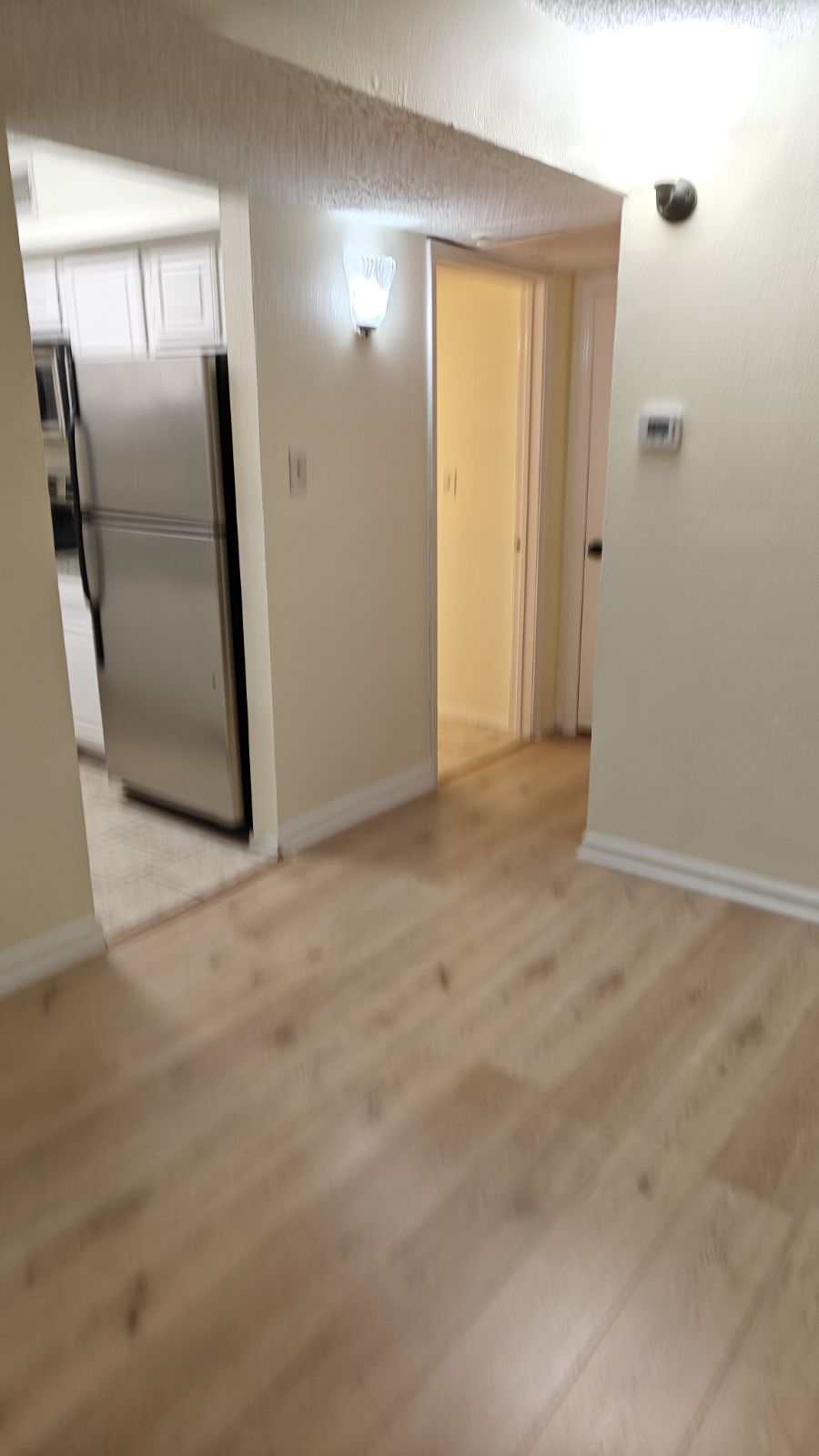 Kitchen and hallway to guest bedroom and bathroom - 11470 Audelia Rd