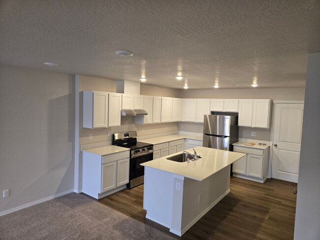 Building Photo - Brand-New 3-Bedroom Townhouse in Hayden Ca...