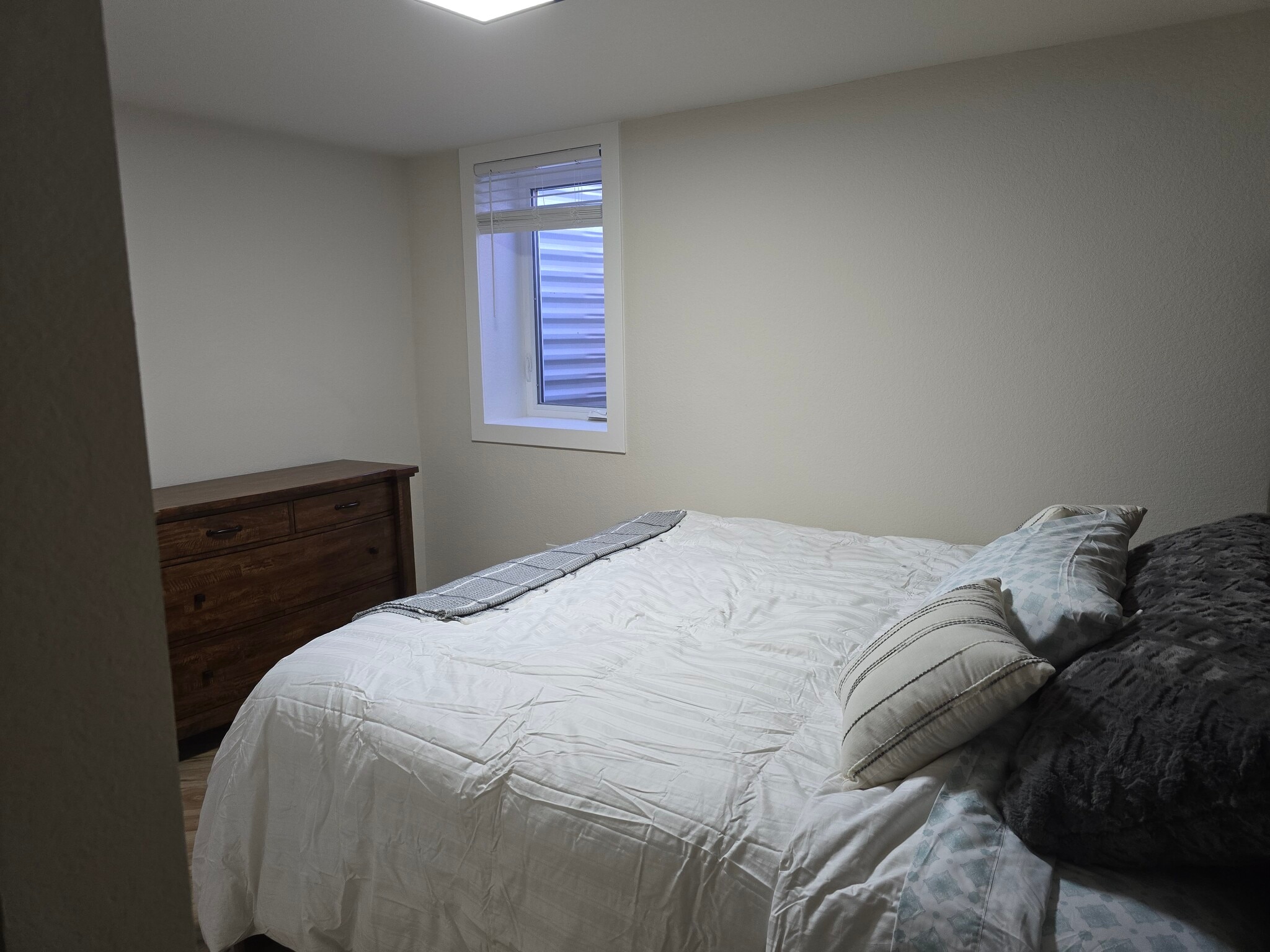 King bed downstairs. - 902 S Zephyr Ct