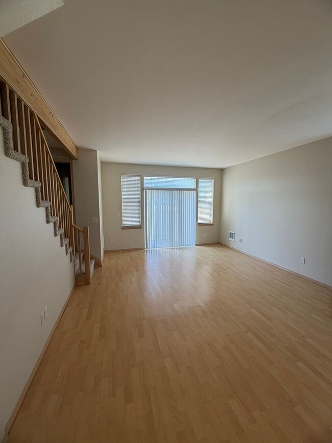 Building Photo - Charming 2-Story Townhome with Vaulted Ceilings