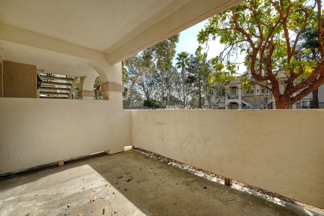 Building Photo - Coastal Living at Its Best – Upgraded 1BR Condo with Private Patio & Resort-Style Amenities