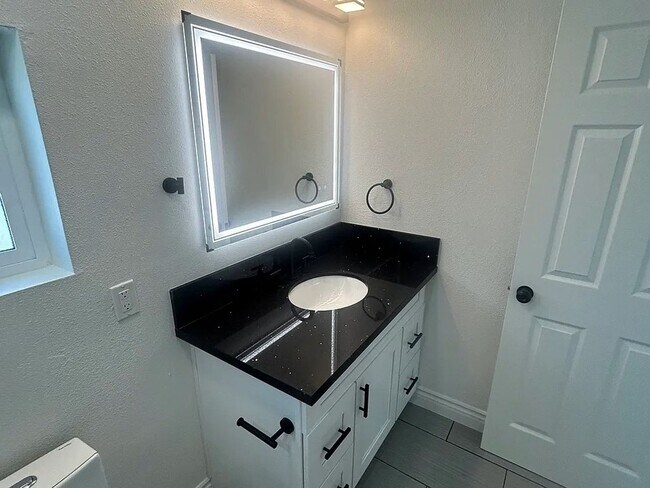 Building Photo - Modern Living! All-New Remodel with LED Li...