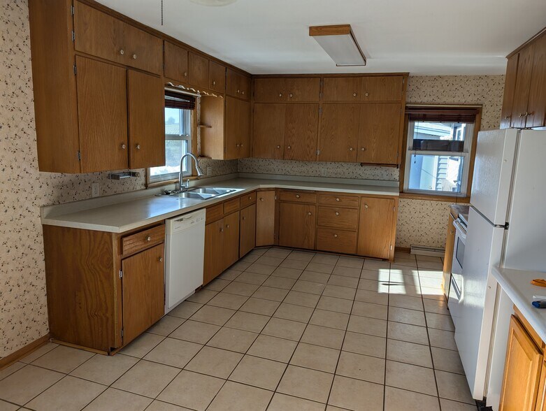 Walk through kitchen, includes dishwasher, fridge - E9461 945th Ave