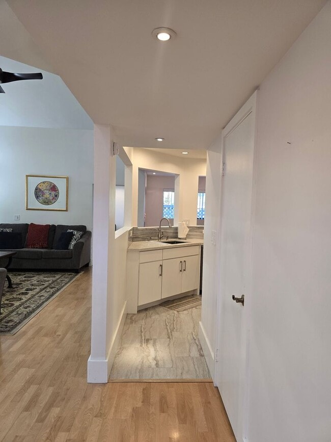 Building Photo - Furnished, 1-Year Long-Term Rental