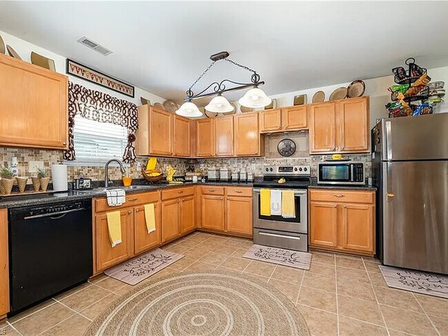 Building Photo - Earn Wealth While Leasing - Like a Homeown...