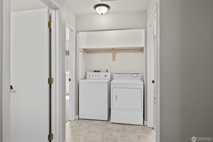 Your own dedicated laundry in the hallway between bedrooms - 502 E River Ave