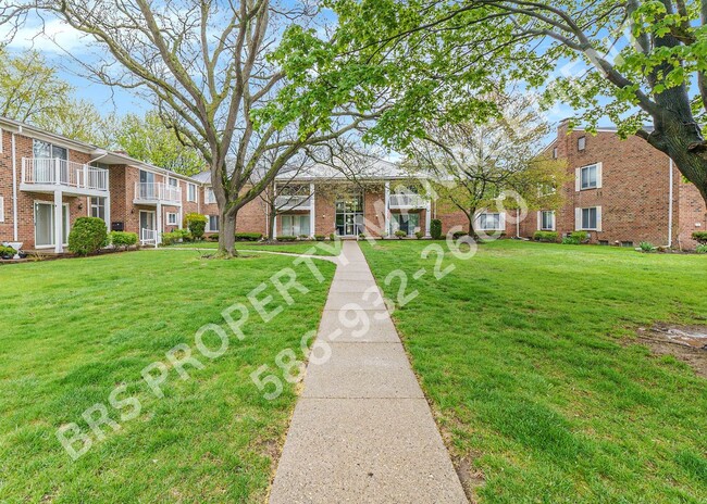 Building Photo - Charming 2-Bedroom Condo in Clinton Twp. –...