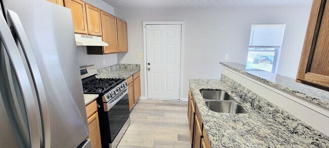 Building Photo - Charming 4BR Home with Modern Upgrades & Spacious Yard