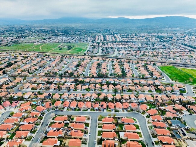 Building Photo - 3220 E Ave S2