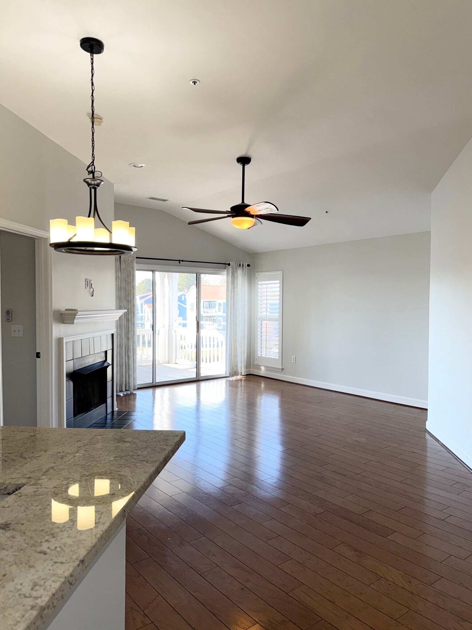 View into dining and living area from kitchen - 1133 Torrence Cir