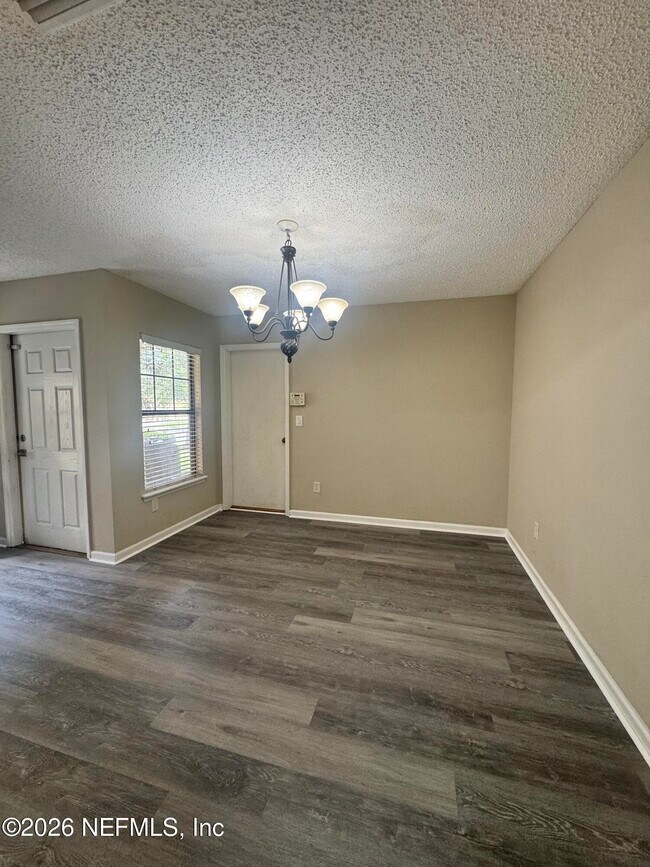 Building Photo - 7772 Playschool Ln