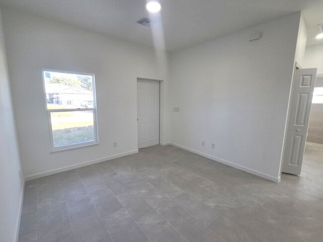 Building Photo - Brand New 2/2/1-PRIME SW LOCATION - Lehigh Acres