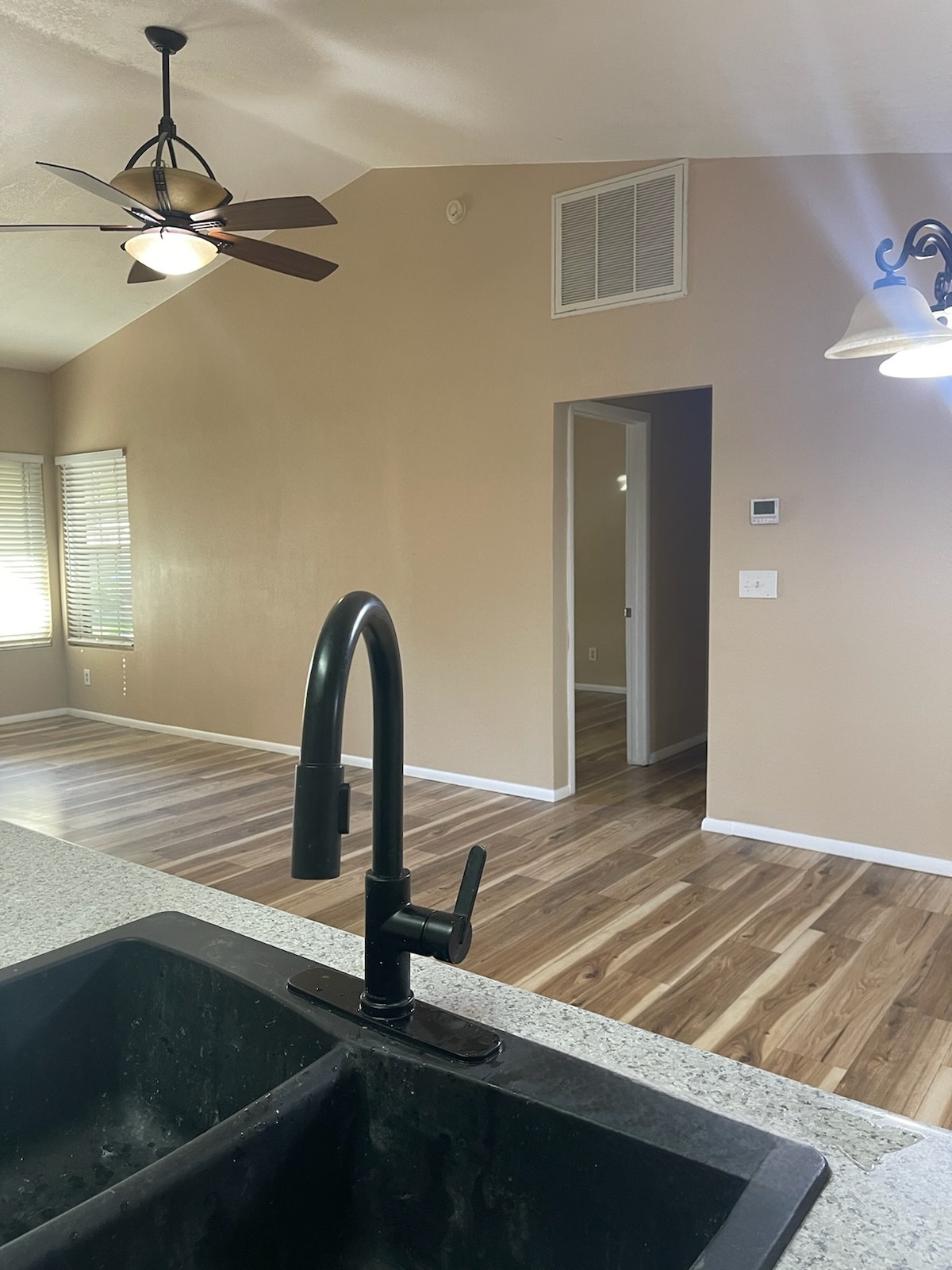 Living Room looking at BR 1 - 8140 N 107th Ave