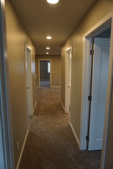 Upstairs hallway to two more bedrooms - 3805 Stacy Dr