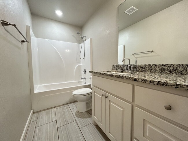 Building Photo - Stunning Duplex in Shallowater!