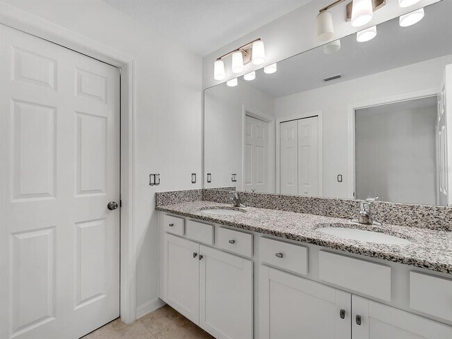 Building Photo - 7323 Pool Compass Loop