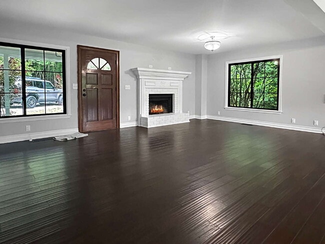 Building Photo - Modern Lake Lanier Retreat | 3BR/3.5BA | Private Swim Dock