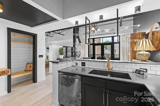 Building Photo - "Chic Urban Living: Spacious 1-Bedroom Ret...