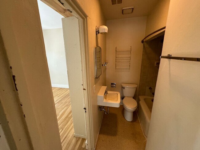 Building Photo - 4 Br, 2 Ba with kitchen appliances and basement for added storage.